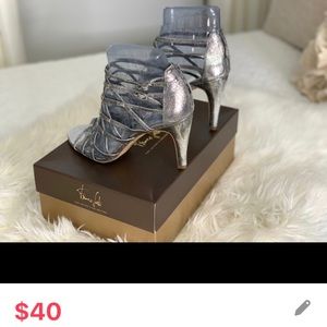 Woman’s silver shoes